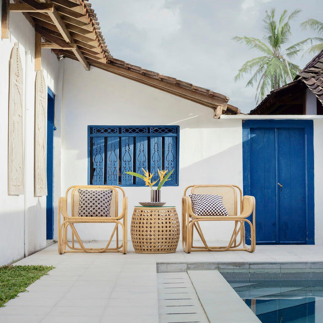 Outdoor wicker table and chairs on a patio