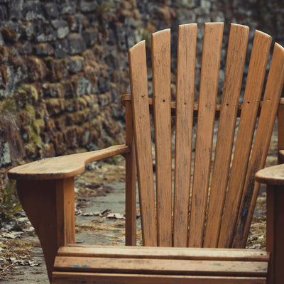 Brown wooden Adirondack chair